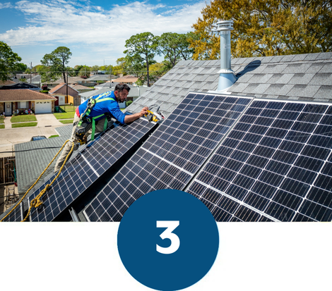 PosiGen employee installing solar